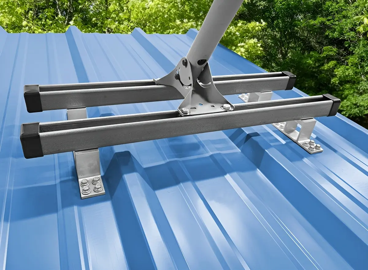 SataMount MRM installation mounted on a blue screw-down metal roof with two rails and a satellite mast bracket